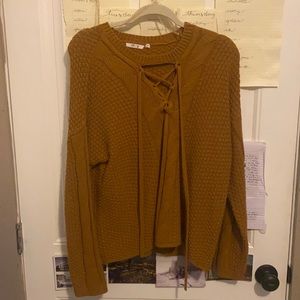Women’s burnt orange lace up ohmg sweater